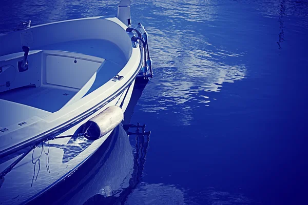 Wooden boat in blue — Stock Photo, Image