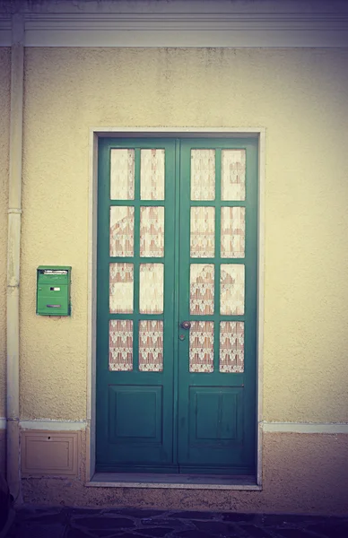 Old door in vintage tone — Stock Photo, Image