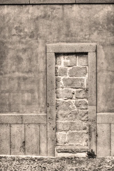 Rustic walled-up door in vintage tone — Stock Photo, Image