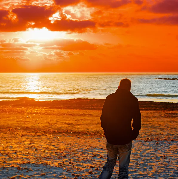 Man alone at the beach — Stock Photo, Image