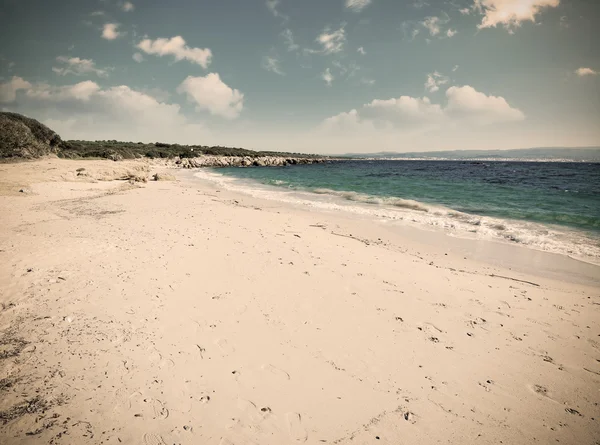 Turquoise water door de kust in vintage Toon — Stockfoto