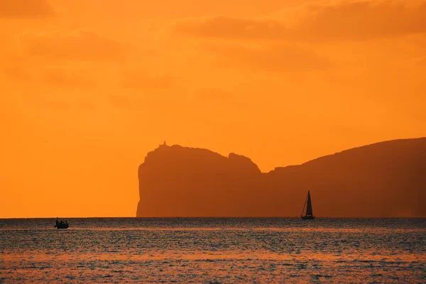 Orange solnedgång över Capo Caccia — Stockfoto