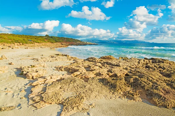 Yellow rocks by Le Bombarde shore — Stock Photo, Image