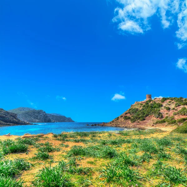 Porticciolo strand onder een blauwe lucht. HDR effect. — Stockfoto