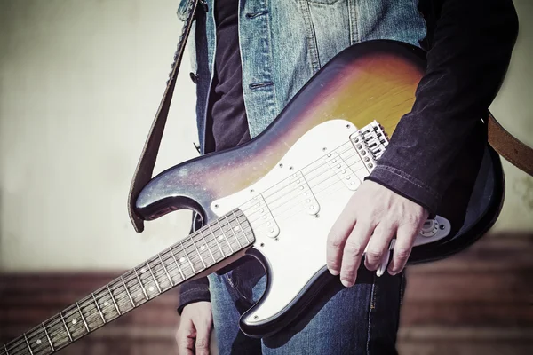 Guitar player in vintage tone — Stock Photo, Image