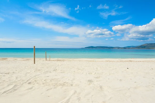 Postes de madera en la playa de Maria Pia — Foto de Stock