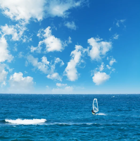 Windsurfing on a cloudy day — Stock Photo, Image