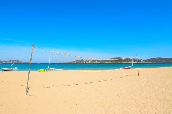 Beach volley net in Porto Pollo beach — Stock Photo, Image