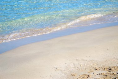 Stintino turkuaz su reklam beyaz kum