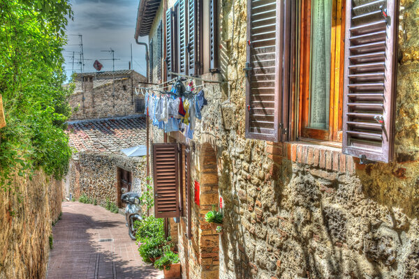Narrow road in San Gimignano in hdr tone mapping effect