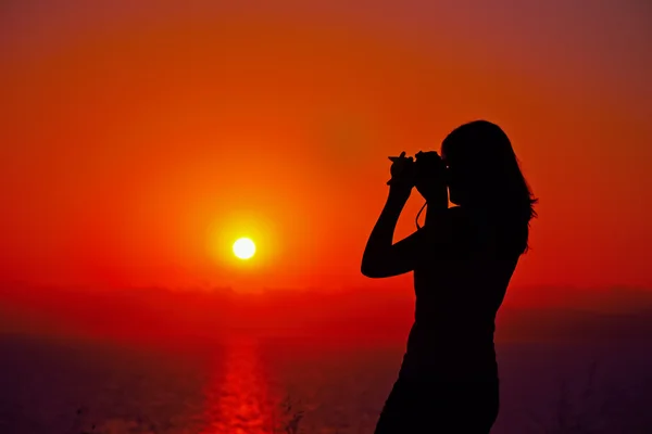 Photographer silhouette at dusk — Stock Photo, Image