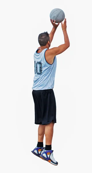 Basketballspiller som skyter på hvit – stockfoto