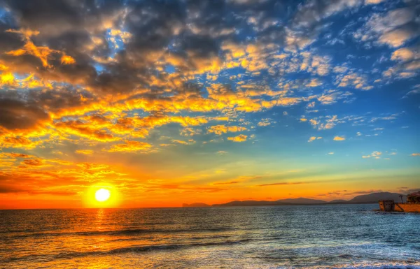 Colorful sunset in Alghero coastline — Stock Photo, Image