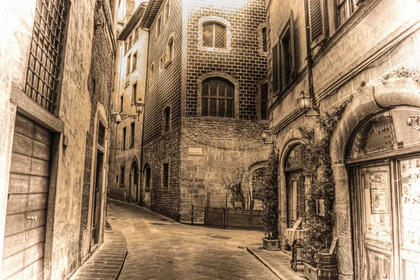 Beautiful narrow street in Florence in sepia tone — Stock Photo, Image