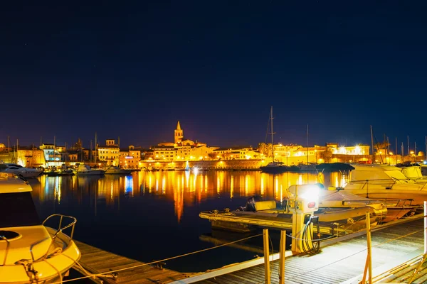 Alghero cityscape seen from the seaport — Stock Photo, Image