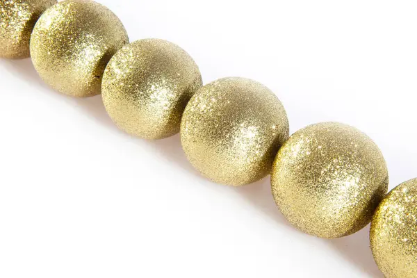 Altın Noel oyuncakları. Tatil için hazırlık