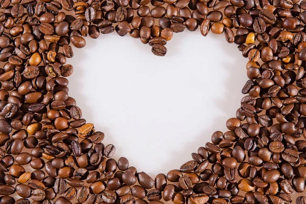 Love symbol in coffee beans. Illustration for the holiday Valentine\'s Day
