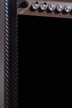 Gitar yükseltici düğmeleri. Çüklü gitar amfisi.