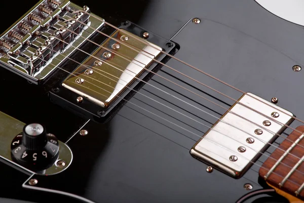 Czarna gitara elektryczna smyczki — Zdjęcie stockowe