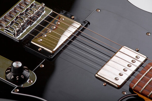 Strings black electric guitar in the large approximation