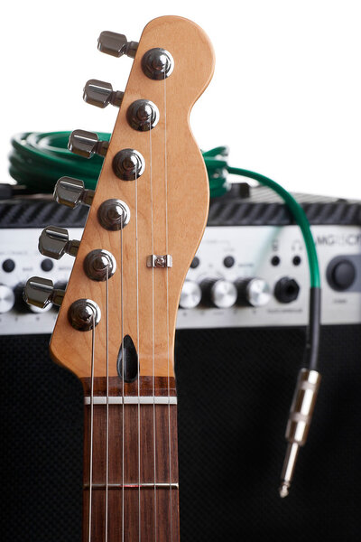Electric guitar and amplifier with a cable in retro style