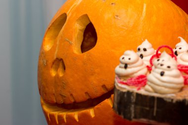 Pumpkins on the decorated table.