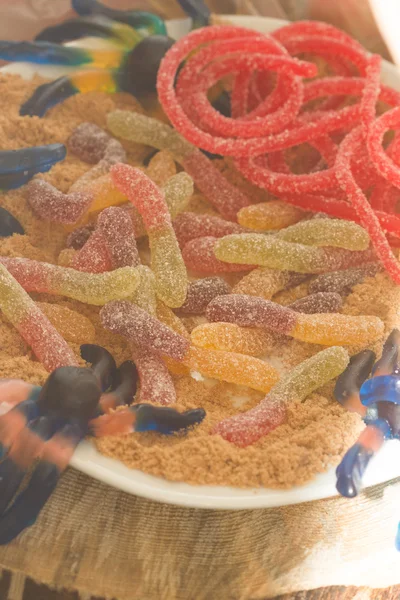 Sweets for Halloween on the holiday table. — Stock Photo, Image