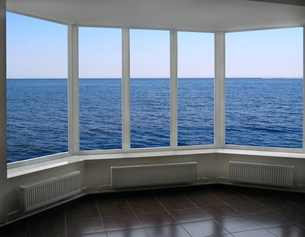 Kunststof venster met uitzicht op oceaan — Stockfoto
