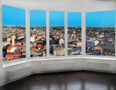 modern windows with view of Lviv from above clipart