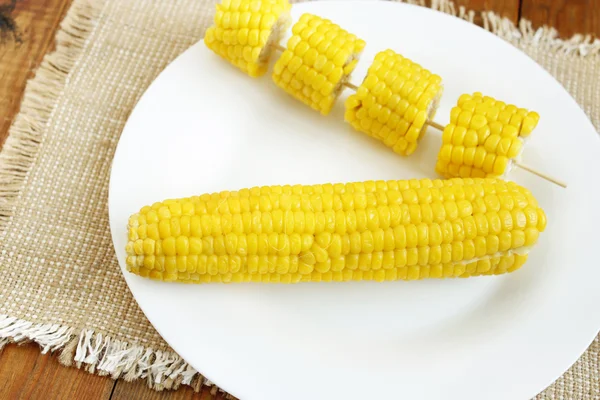 Dish with boiled corns — Stock Photo, Image
