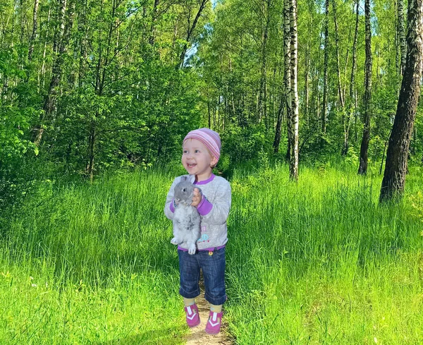 Girl Rabbit Arms Standing Path Spring Park Happy Child Pet — Photo