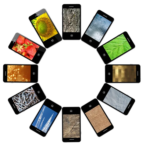 Telefoni cellulari moderni con immagini diverse — Foto Stock