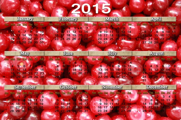 Calendar for 2015 year on the red cherries background — Stock Photo, Image