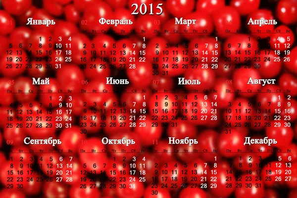 Kalendář na rok 2015 na červeném pozadí třešeň v ruštině — Stock fotografie