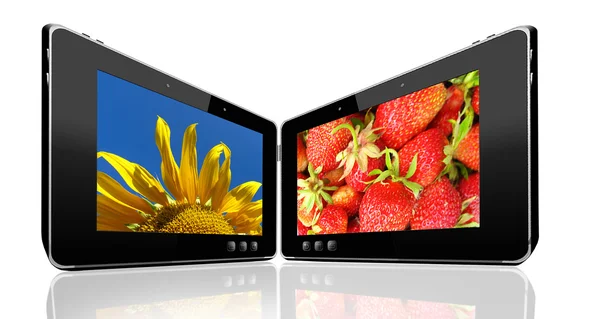 Zwei Tablets mit kunterbunten Bildern — Stockfoto