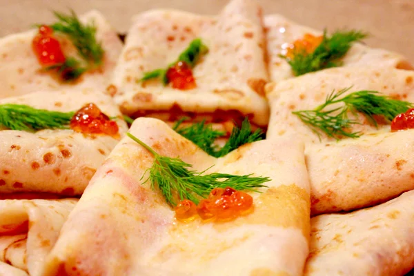 Pancakes with red caviar and fennel — Stock Photo, Image