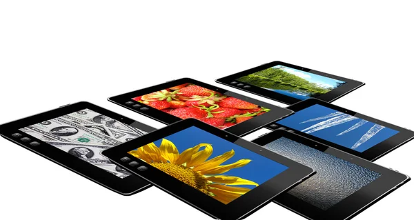 Some black tablets with motley pictures — Stock Photo, Image