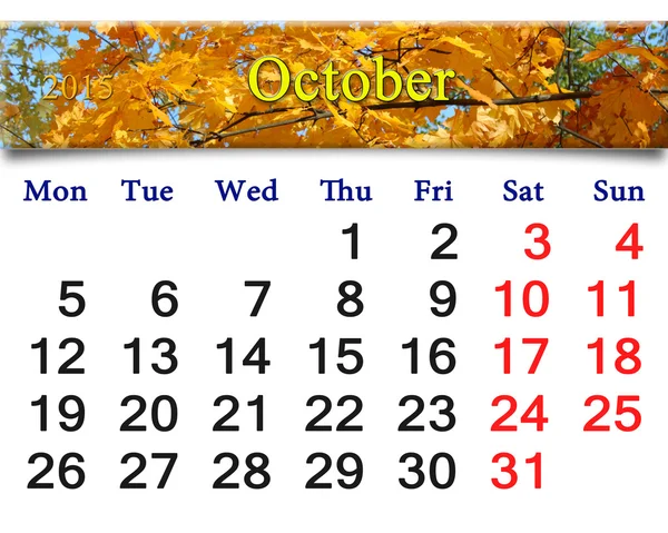 Kalendarz do października 2015 z żółtym pozostawia — Zdjęcie stockowe