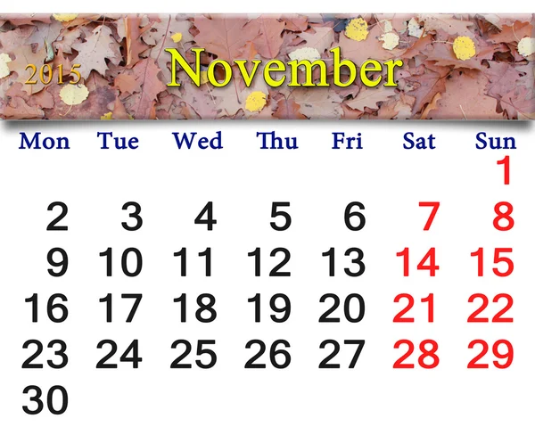 Kalendarz dla listopada 2015 z żółtym pozostawia — Zdjęcie stockowe