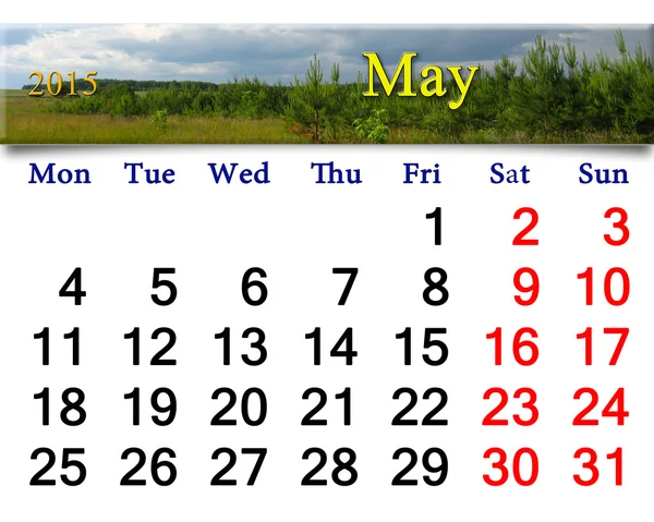 Kalender voor mei van 2015 met thunder storm wolken en dennen — Stockfoto