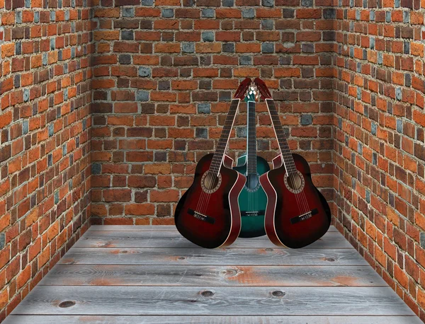 Drie gitaren in de hoek van de kamer — Stockfoto