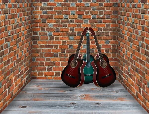 Trois guitares dans le coin de la pièce — Photo