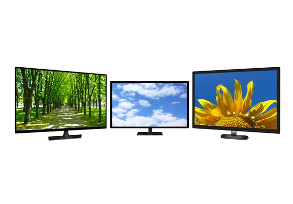 Drei moderne Fernseher mit unterschiedlichen Bildern — Stockfoto