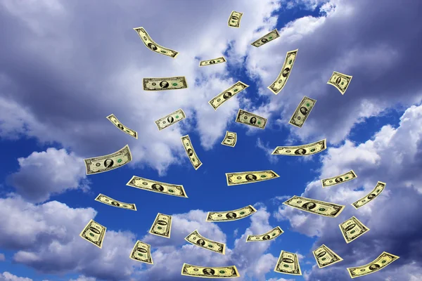 Billets en dollars s'envolent dans le ciel — Photo