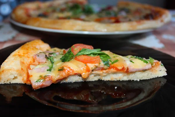 Appetizing pieces of pizza — Stock Photo, Image