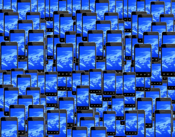 Teléfonos inteligentes con imagen de cielo azul —  Fotos de Stock
