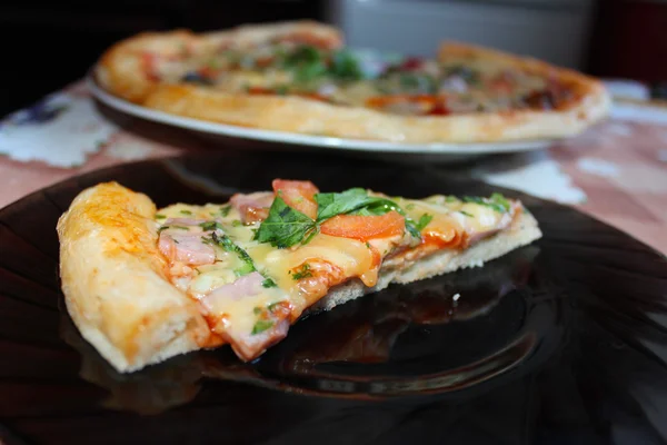 Pieces of appetizing pizza — Stock Photo, Image