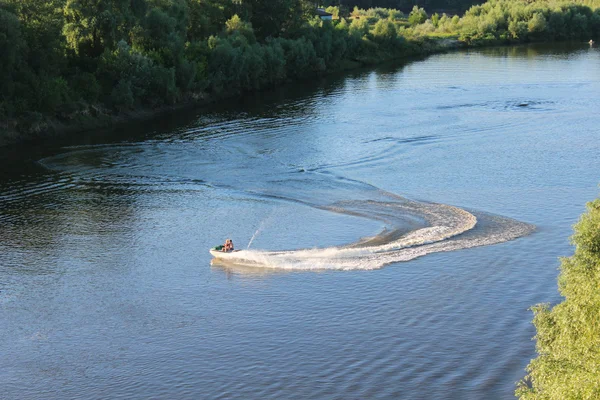 Couple of people in quadski going on the river — Stock Photo, Image