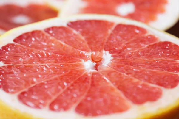 Grapefruit red cut by pieces — Stock Photo, Image