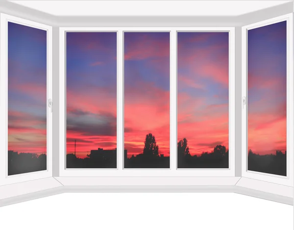 Műanyag ablakokkal, kilátással a vörös naplemente — Stock Fotó